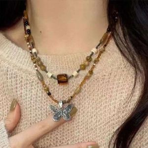 Stile Nuova collana quadrata di perline cinese per donne con una nicchia di fascia alta Sense etnica Etnica Stile impilato Pendente a farfalla Collotta STCKED PNT Collrbone