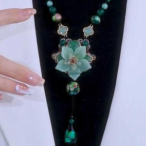 2024New trendy ethnic high-end necklace with green lotus shaped sweater chain autumn and winter clothing pendant