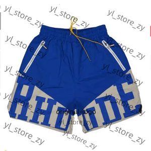 Designer masculino shorts shorts de verão calça de praia de alta qualidade rhude short street desgaste vermelho azul preto calça roxa malha giration zipper tiro 34c6