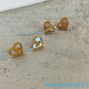 2024 Tasarımcı Lüks Xitai Queenjewellery Stud Summer Queen Anne Diamond Damlı Aşk Kadın Azınlık Satürn Peach Kalp Beyaz Kabuk Küpe