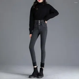 Pantaloni femminili morbidi jeans jeans in alto pelliccia in finta pelliccia inverno slim fit matita calda con chiusura dei bottoni per l'autunno