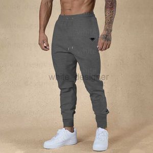 Designer Pants Mężczyźni Solidny kolor spodni wiosna/lato nowe męskie spodnie sportowe legginsy swobodne spodni fitness Spodnie