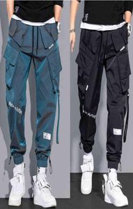 Hip Hop Streetwear Joggers Pants Men Dent Casual Cargo Pant Spodni High Street Elastic Talia luźna laser Harem Pant Boys G2204134736862