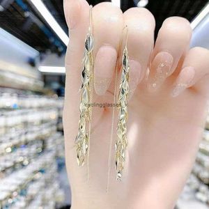 2024 Korean metallic leaf long earrings wheat ears exquisite and niche slimming anti loss earline