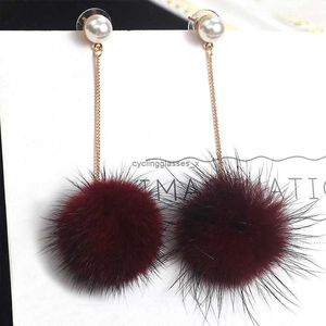 2024 New Korean version mink fur long earrings simple and versatile pearl ball autumn winter womens trend