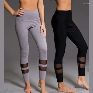 Abiti da yoga spingendo pantaloni sportivi Donne fitness Solid Sport Leggings High Wius per la ginnastica Mesh 2024