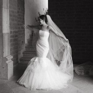 Vintage Long Sleeveless Ivory Tulle Wedding Dresses Mermaid Strapless Lace Up Back Vestido de novia Sweep Train Trumpet Bridal Gowns for Women