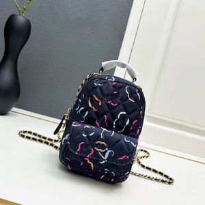 Книжные сумки резервные дизайнерские дизайнер роскошной дизайнер рюкзак CC Mini Водонепроницаемая ткань Женская милая рюкзак