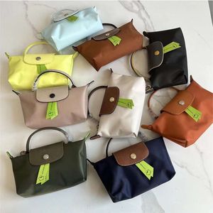 Elegant mini handväska med kvinnor kosmetisk väska y2k populär söt liten fyrkantig väska