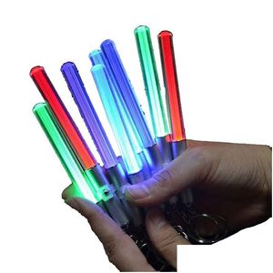 Keychains Lanyards LED -ficklampa Stick Keychain Mini Torch Aluminium Nyckelring Hållbar glöd penna Magic Wand Lightsaber Drop Delivery Dh1zm
