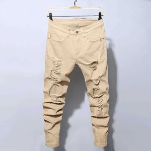 Męskie spodnie modne styl uliczny Raped chude dżinsy Mężczyźni Vintage Wash Solidne dżinsowe spodnie męskie Men Casual Slim Fit Denim Spodnie Gorąca wyprzedaż J240527