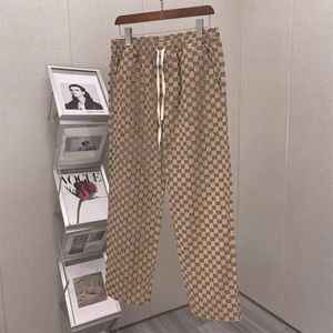 Designerskie spodnie luźne proste spodni plus size sznurka Hip Hop Street Slack jakość jesienna zimowe spodnie podwójne g liter