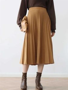 スカート秋の冬の女性ファッションのための長いスカート2024シックなプリーツスカートレディースソリッドカラールーズエレガントなAラインスカート女性Y240528