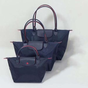 2024 Nya lyxiga tygväskor lyxiga kvinnors designer märke S-klass handväska högkvalitativ stor damer tygväskor kvinnliga axelhandväskor