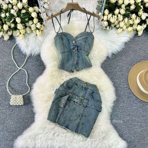 Summer small denim set with sweet and spicy slim fit suspender denim top and short skirt with buttocks wrapped two-piece set