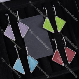 Ny designer triangelhänge örhängen kvinnor öronnötter triangulära studs smycken med låda