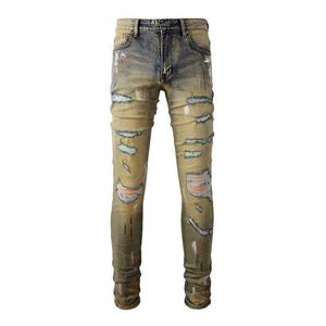 Męskie dżinsy męskie rozrywanie elastycznych dżinsów z vintage niebieskie spodni w trudnych spodłach cienkie zwężające się spodnie J240527