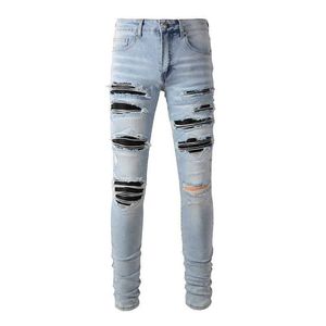 Мужские джинсы мужские высококачественные улицы Классическая синяя плотная эластичная поврежденная отверстие кожаное ребристое пластырь разрывает джинсы J240527