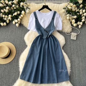 Korean style sweet and fake two-piece dress for women with a sense of niche design. Round neck bubble sleeve patchwork waist cinched denim skirt long skirt