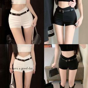 Verão novo shorts casuais sexy e elegantes versáteis e elegantes e elegante e elegante e elegante, calça quente embrulhada, 511