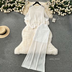Koreansk stilklänning med en lat stil inställd löst passande stickad topp ihålig uthög midja lång kjol tvådelar set trendig