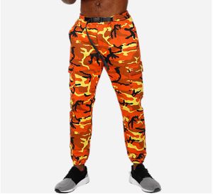 Pomarańczowe kamuflażki spodnie Mężczyźni mody taktyczne taktyczne chude spodnie sportowe spodnie haremowe Camo Pink Pants for Menwomen 2001811444