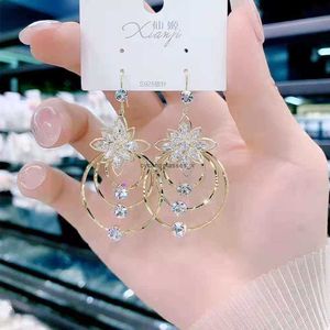 2024 Korean crystal flower circular earrings womens atmospheric ice zircon geometric exaggerated temperament