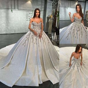 Błyszczące kryształowe arabskie sukienki ślubne suknie balowe paski spaghetti Applique suknia ślubna koralika koronkowa