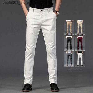 Męskie spodnie Spring Mens Business Prosty pasek Stripe Spodnie Wysokiej jakości Brytyjska moda miękka elastyczny spodnie Czarno -białe Khaki Gray Q240529