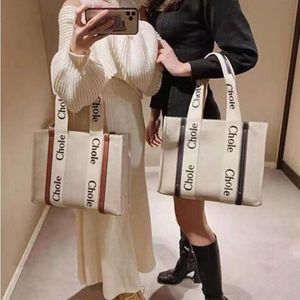 Hot Sell Top Home Big Thorping Bag Man Women Large Crace Beach Canvas Bag Leisure Close Handbag Counter Counter Bags with Orium Tag Card 301R