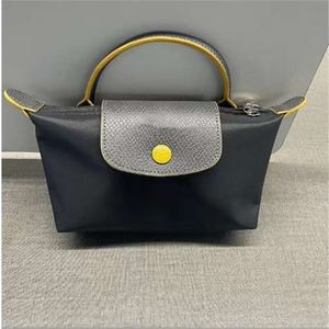 2024 Bolsa de designer Mini bolsa de bolsa de bolsa de bolsa feminina Mini Bolsa de mão Proteção Ambiental Mini Mini Saco de Telefone