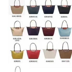 Designer handväska hög platta underarmsäck teto väska handväska enkel axel dumpling väska 70 -årsjubileum för kvinnors