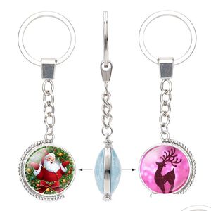 Keychains Lanyards Julglas Cabochon Double Sides Reindeer Tree Santa Claus Bell Snowman Pendant Rotable Key Chain Jewelry D DH14L