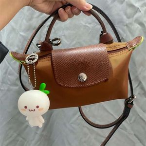 Designer Handbag Mini Fashionable Dumpling Bag Versatile Handheld Large Capacity Storage Makeup Small Bag Womens Single Shoulder Oblique Straddle Phone Bag