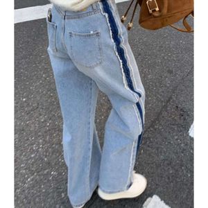 Fashionabla kontrasterande tofs fransar raka ben jeans för kvinnors vår och sommar hög midja lös och mångsidig smala breda benbyxor