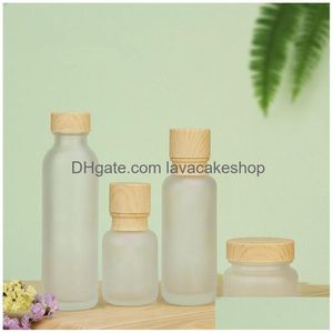 Packing Bottles Wholesale Frosted Glass Jar Lotion Cream Round Cosmetic Jars Hand Face Pump Bottle With Wood Grain Cap Hha3475 Drop De Dhpft