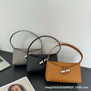 Designer handväska Ny Roseay -serie bambu underarms påse fashionabla singel axel kvinnors väska diagonal straddle väska handväska
