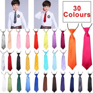 Bow Ties School Boy Uniform Necktie 2022 Fashion Neck Tie Tie عالي الجودة للأطفال زفاف زفاف ألوان صلبة نطاقات مرنة 265 ب