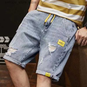 Shorts masculinos masculinos soltos de cinco peças calças de jeans de calça de cintura elástica casual hole de moda coreana jeans calças curtas Q240529