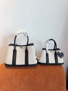 Bolsa de designer de luxo Moda clássica Couro de couro Bolsa de compras de coloração sólida comutora