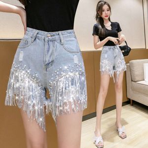 Short pants for women in spring and summer, thin and popular on the internet, high waisted with diamond inlay, heavy-duty tassel denim, three piece pants,