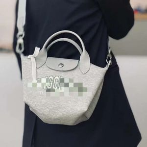Дизайнерская сумочка Longjia Новая мини -мешок для пельмени женская академия