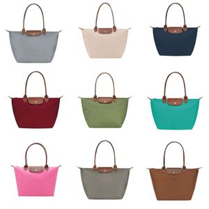 Designer handväska högversion väska klassisk kvinnors väska 70 -årsjubileum underarmspåse axelväska klimp väska handväska påsar