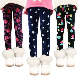 Legginsy Rajstopy Szorty Nowe dziewczynki spodnie jesienne zimowe dziecięce spodnie ciepłe ggings grube aksamitne gwiazda drukowana dziecięce spodnie Baby Girl GGINGS WX5.29