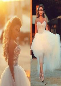 Korset Top Suknie ślubne 2019 Pearki z koralikami High Low Tiul Summer Beach Country Suknie ślubne Saudyjskie Arabskie Luksus Modest1408212