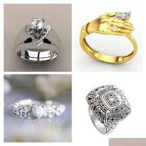 With Side Stones 2024 Mens And Womens Rings Personalized Fashion Retro Style Hollow Inlaid Round White Zircon Pair Single Product Dir Dh6Ia