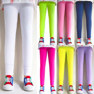 Kläder våren leggings 2024 New Kids Girls Milk Silk Slim Tight Summer Candy Color Korean Children's Pants F4531
