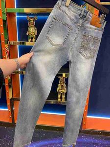 Jeans masculino jeans masculino 2024 Marca de moda fina de verão Slim Fit Feet Small Feet American Casual Versátil Pants 91988 FFC2