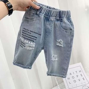 Barn rippade våren Autumn Boys Girls Denim Jeans Korean Fashion Kids Byxor Toddler Casual Loose Pants 2024 L2405