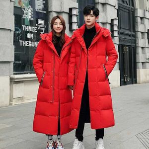 Men's Down Parkas Winter Winter de alta qualidade resistente a frio jaqueta para mulheres e homens 2023 Novo jaqueta de algodão longa e moderna com capuz Z240530